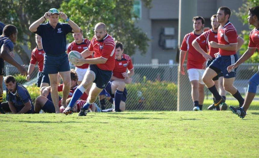 Kristian Pfeffer at flanker for Florida Atlantic University rugby, breaking with the ball